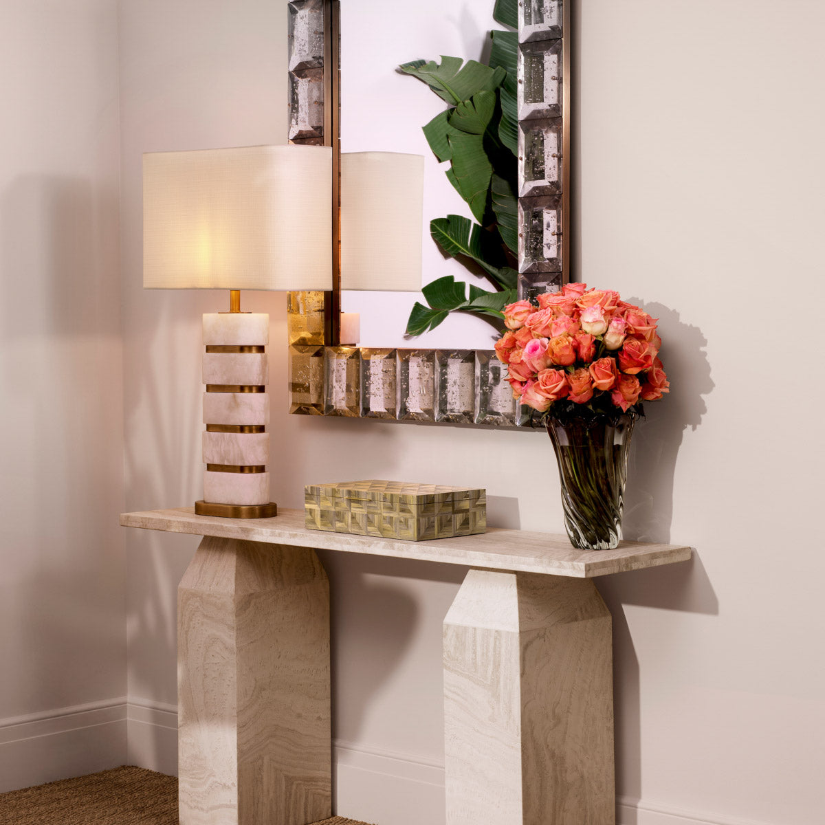 Eichholtz Console Table Tarragona from luxurious travertine, its unique natural beauty is showcased through variations in color, texture,...
