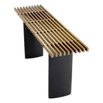 Eichholtz Console Table Vauclair trellis in a brushed brass finish, its distinctive tabletop rests on two black ellipse legs.