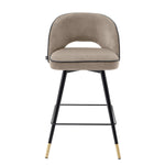 Eichholtz Counter Stool Cliff holds an armless back that is open at the bottom before the seat. Its stylish