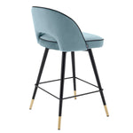 Eichholtz Counter Stool Cliff silhouette is accentuated with black faux leather piping. Counter Stool Cliff Crafted by Eichholtz this