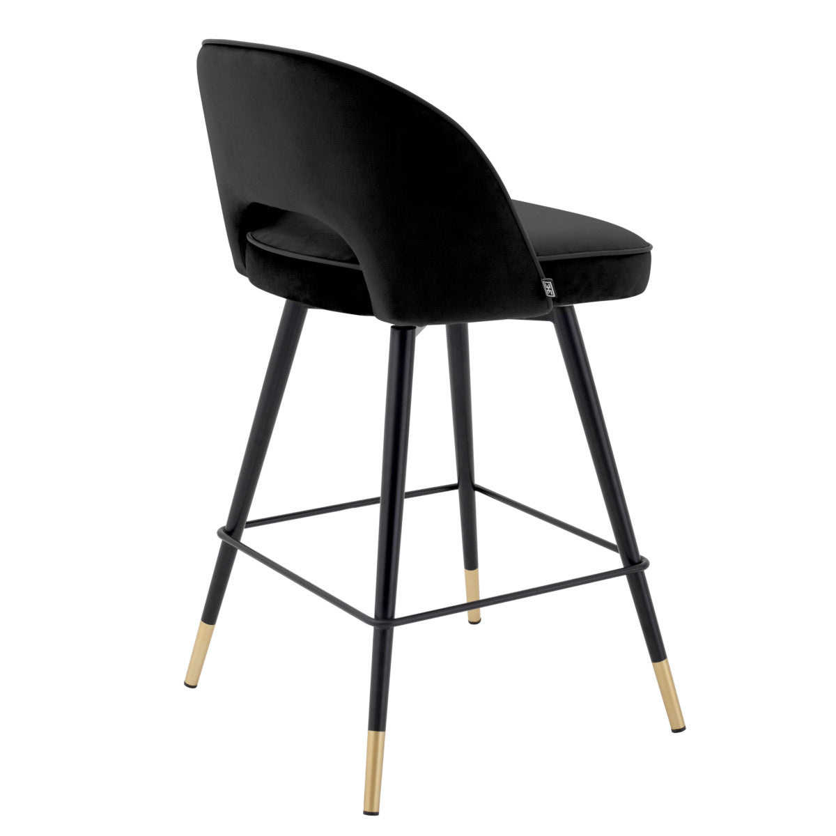 Eichholtz Counter Stool Cliff silhouette is accentuated with black faux leather piping. Counter Stool Cliff Crafted by Eichholtz this