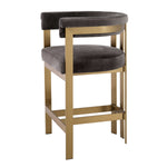 Eichholtz Counter Stool Clubhouse unmatched comfort and style. The brushed brass finish adds a touch of opulence, making it