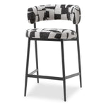 Eichholtz Counter Stool Folsom Discover the sophisticated artistry of the Eichholtz Counter Stool Folsom. This exclusive piece features bold
