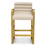 Eichholtz Counter Stool Olsen sand finish on metal construction radiates elegance, offering an iconic touch to your space. Counter