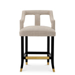 Eichholtz Counter Stool Roumier with brass accents, our interpretation of the Museum's chair exudes refined sophistication. Infuse your...
