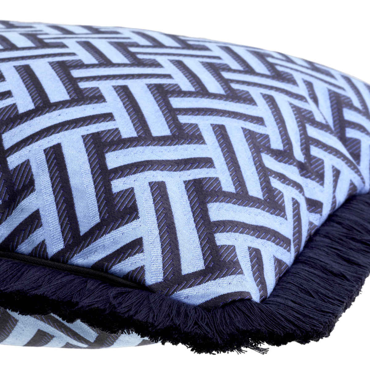 Eichholtz Cushion Doris L accentuated by dark blue fringe accents. The vibrant blue Doris print on a white backdrop