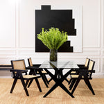 Eichholtz Dining Chair Aristide Aristide Chair exudes vintage style. Crafted from solid wood, this sturdy dining chair with arms