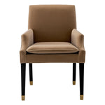 Eichholtz Dining Chair Clayton Merino Camel fabric and featuring black legs, this chair exudes sophistication and comfort. Experience the