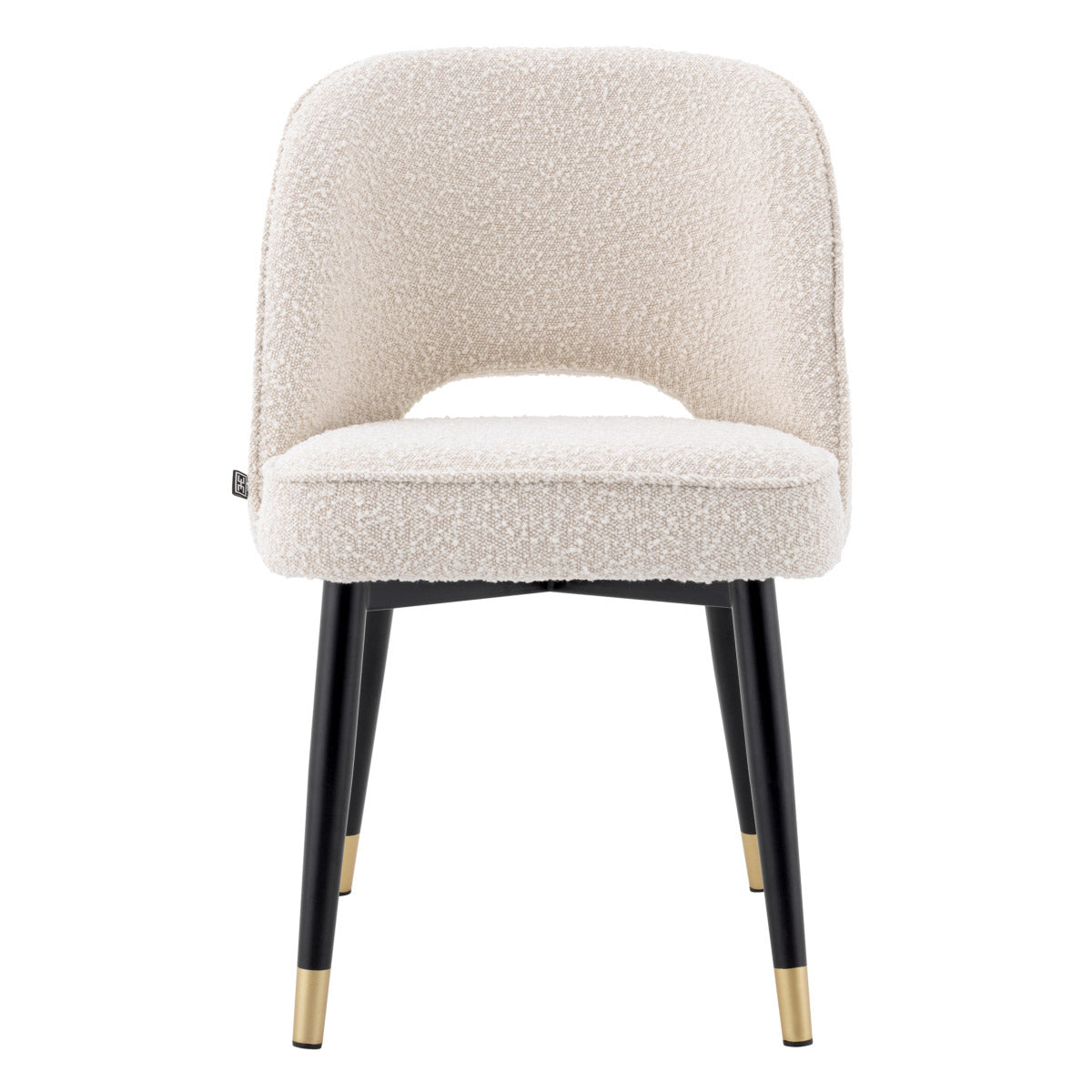 Eichholtz Dining Chair Cliff solid frame holds an armless back that is open at the bottom before the seat.