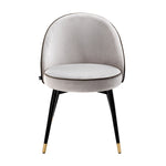 Eichholtz Dining Chair Cooper set of 2 Roche light grey velvet upholstery with dark grey piping, tapered black legs and brass caps.
