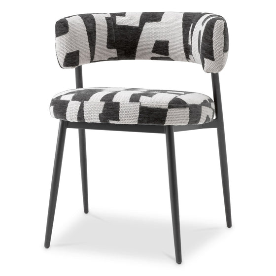 Eichholtz Dining Chair Folsom Elevate your dining experience with the Dining Chair Folsom by Eichholtz. Crafted with exquisite craftsmans...