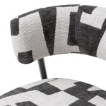 Eichholtz Dining Chair Folsom of fabric and metal exudes sophisticated elegance, making it an ideal addition to any modern