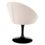 Eichholtz Dining Chair O'Neill base. The tub-shaped seat is upholstered in a lush BouclÃ© cream fabric.Â Dining Chair O'Neill