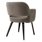 Eichholtz Dining chair Park brown fabric with sleek black legs, it exudes sophistication. This chair features mostly natural materials,