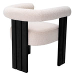 Eichholtz Dining Chair Percy armrests. Upholstered in a BouclÃ© cream fabric, it allows your guests to enjoy seating for