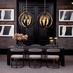 Eichholtz Dining Table Atelier S combines traditional craftsmanship with modern production techniques. This charcoal grey oak veneer dini...