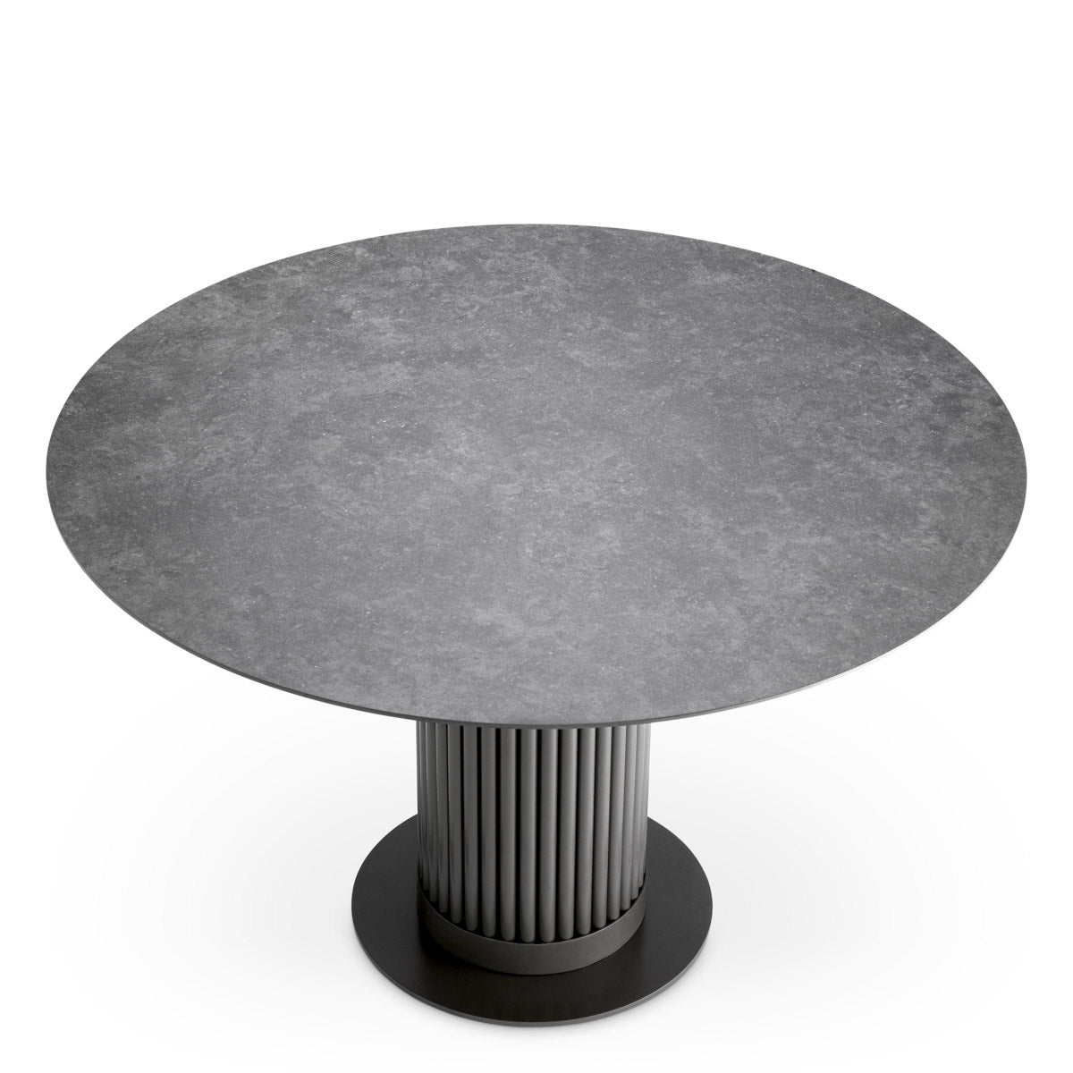 Eichholtz Dining Table Volterra Round features a sturdy metal base with a bronze finish and a ceramic top that mimics