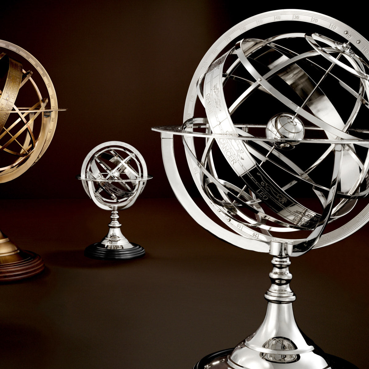 Eichholtz Globe S zodiac, axis and pedestal with black plinth, this small nickel finished globe lends character to