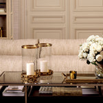 Eichholtz Hurricane Clementine L a vintage brass finish and clear glass, adorned with a detailed chain for an iconic