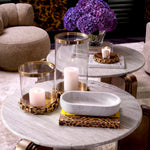 Eichholtz Hurricane Clementine S a vintage brass finish and clear glass, adorned with a detailed chain for an iconic