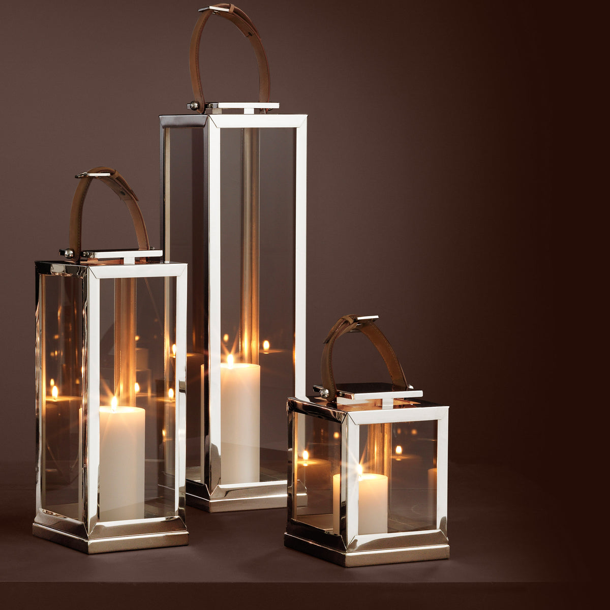 Eichholtz Hurricane Georgian L Its solid and decorative design with four glass panels encases candles to burn safely (candles