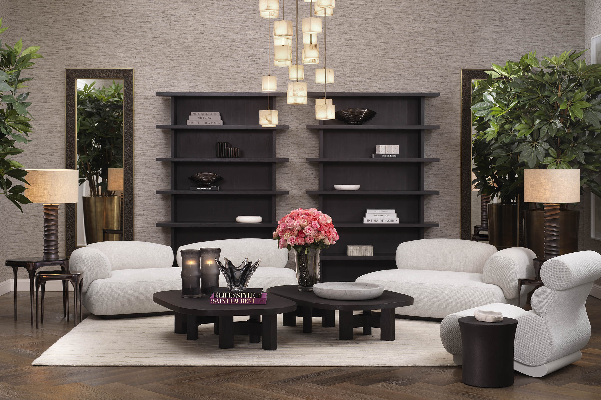 A curated Eichholtz room vignette — layered lighting, console, and wall art in a warm-toned setting