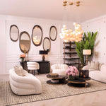 Eichholtz Mirror Karma M its organic shape and mesmerizing bronze highlight finish, it exudes elegance and charm. For an
