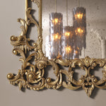 Eichholtz Mirror Rococo Inspired by The Met, this mirror boasts an antique gold finish and antique mirror glass.