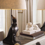 Eichholtz Object Reclining lion marble. Handcrafted with precision, each piece is unique, showcasing variations in color and veining. It