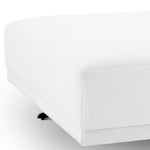 Eichholtz Ottoman Endless can be combined with the sofa and chair from this series for a flexible and