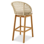Eichholtz Outdoor Bar Stool Trinity luxury and a timeless charm. Artisan craftsmanship is evident in the intricate rope detailing, providing