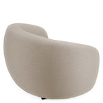Eichholtz Outdoor Chair Brice curves and the neutral elegance of sand tones invite relaxation, making it an ideal choice