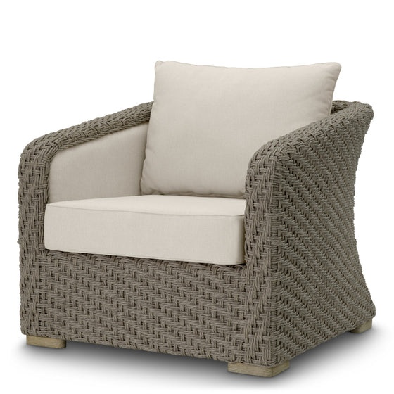 Eichholtz Outdoor Chair Bryson Enhance your outdoor sanctuary with the Bryson Outdoor Chair. Featuring luxurious faux woven rattan in