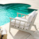 Eichholtz Outdoor Chair Cap-Ferrat outdoors. Provided with Sunbrella cushions, the ergonomically designed structure ensures optimal seati...