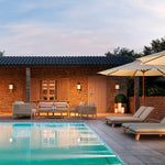 Eichholtz Outdoor Coffee Table Anthony teak and milky glass. Perfect for covered outdoor settings, its durable allure and clean design