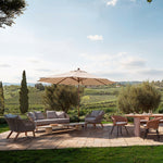 Eichholtz Outdoor Coffee Table Aurore concrete, its faux travertine finish exudes timeless elegance and durability. This refined piece se...