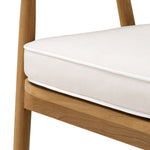 Eichholtz Outdoor Dining Chair Beale space with the Outdoor Dining Chair Beale, a blend of natural teak elegance and Flores