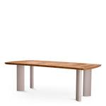 Eichholtz Outdoor Dining Table Osario wood showcases the table's timeless beauty. Standing gracefully on ellipse shaped legs made from po...