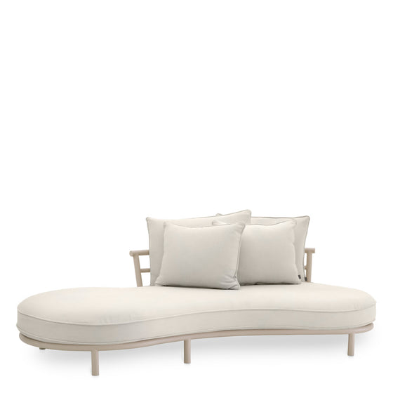 Eichholtz Outdoor Sofa Laguno right Elevate your outdoor lounging experience with the Laguno Outdoor Sofa. With a sand finish that