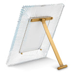 Eichholtz Picture Frame Camille brass finish, complemented by intricately carved clear glass. Perfect for high-end interiors, it transfor...