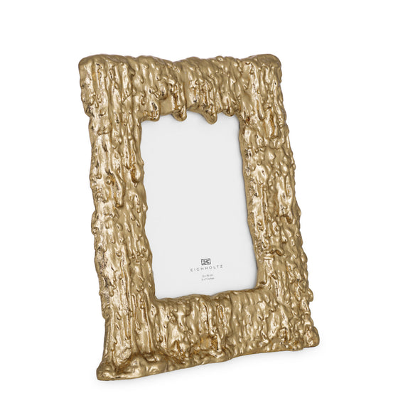Eichholtz Picture Frame Cotati S Elevate your cherished photographs with the Cotati S Picture Frame from Eichholtz. A luxurious gold