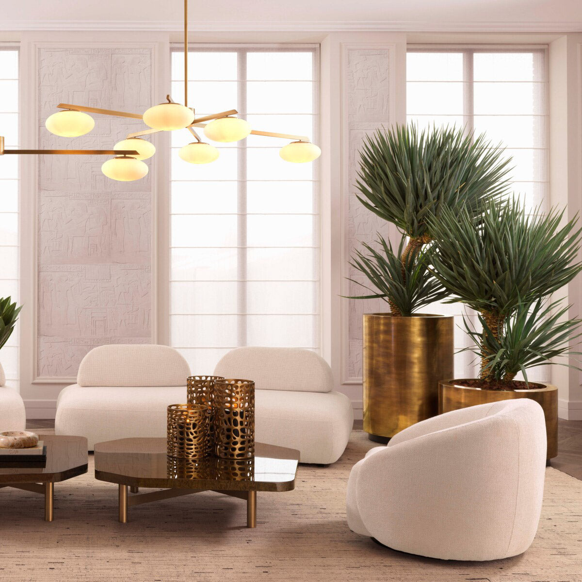 Eichholtz Planter Jasper round high showcases a vintage brass finish, imbuing it with a sophisticated antiquity ideal for any luxury