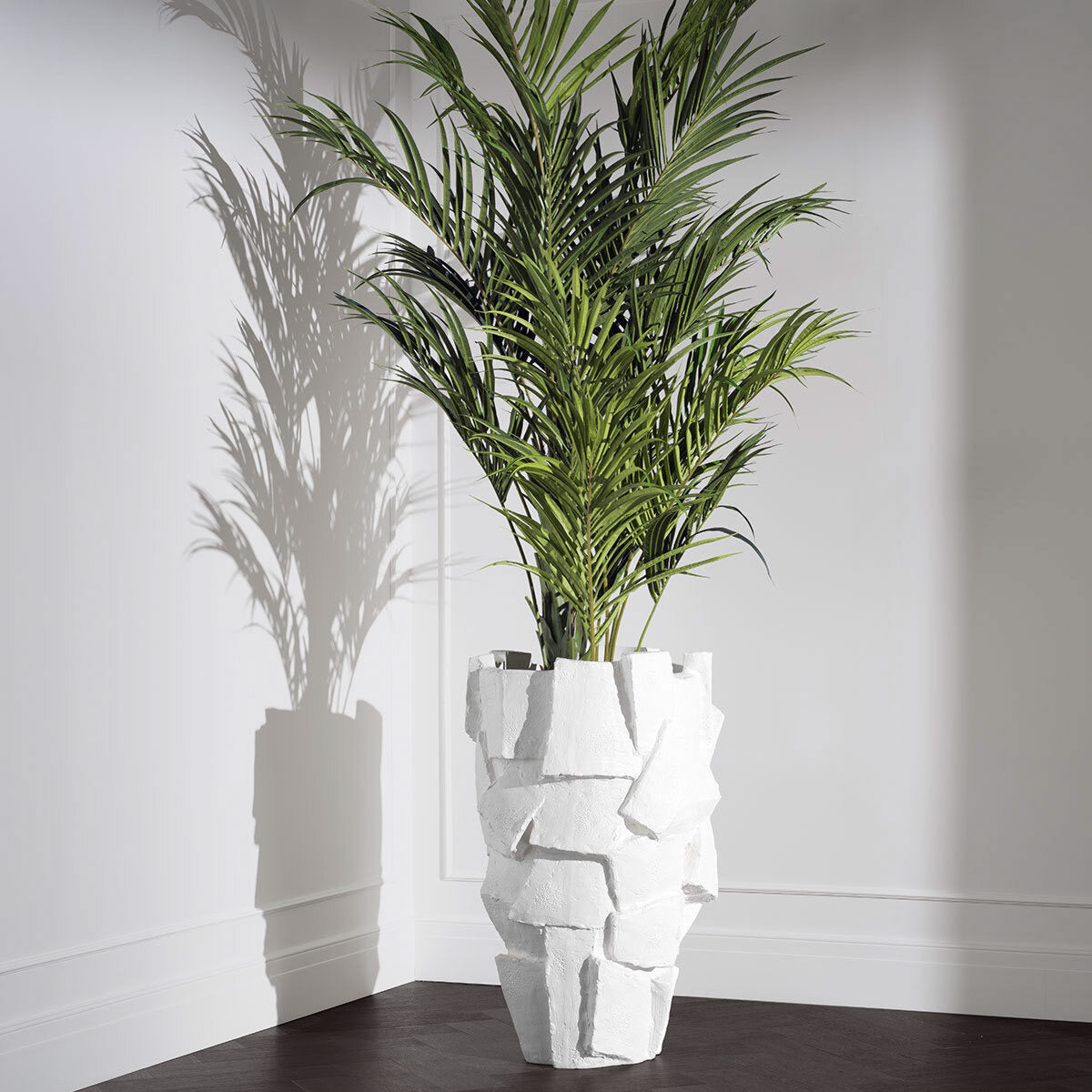 Eichholtz Planter Sevilla fibreglass for easy handling and long-lasting durability. It features a luxuriously minimalist matte white finish