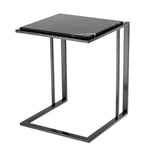 Eichholtz Side Table Cocktail The Cocktail Side Table comprises a sleek bronze finished frame and an elegant black marble