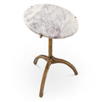 Eichholtz Side Table Cortina oval appeal and the natural variations in the marble make each piece unique. Add a touch