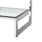 Eichholtz Side Table Gamma stainless steel, it features a polished finish and a clear glass tabletop. Side Table Gamma