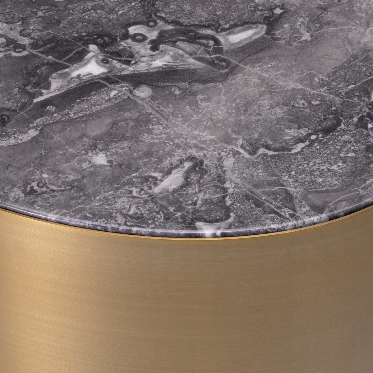 Eichholtz Side Table Porter oval black base and a grey marble top. The warm look of the brass counterpoints the
