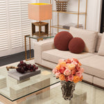 Eichholtz Sofa Aurora S styled with four back cushions, two of which are button-tufted giving a tailored look. Nuoro