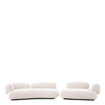 Eichholtz Sofa Cabrera of contemporary flair to its classic design. Supported by a sleek black wooden base, this