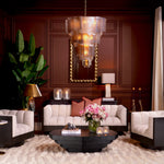 Eichholtz Sofa Davide upholstery and black finish accents. Perfect for elevating your living space, each sofa showcases signature